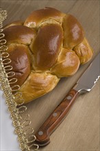 Closeup of a loaf of challah bread.
