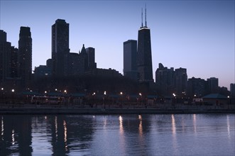 Skyline at sunrise with Lake Michigan Chicago Illinois USA.