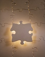 Oversized copper jigsaw puzzle.