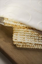 Close up of Matzah under cloth.