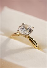 Closeup of a diamond engagement ring.