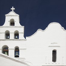 Building facade and church bells, Mission San Diego de Alcala, San Diego, California, United States.