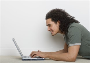 Man using a laptop computer.