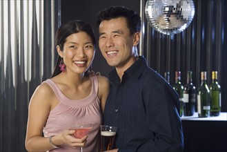 Couple having drinks in a bar.