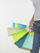 Woman holding shopping bags.