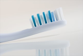 Close up of toothbrush.