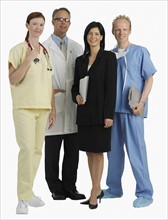 Studio shot of medical professionals smiling.