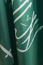 Close up of flag of Saudi Arabia.