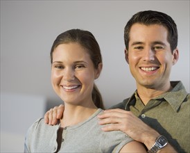 Close up of couple smiling.