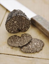 Close up of sliced black truffle.