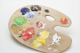 Studio shot of artist's palette with paint.