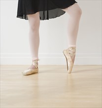 Close up of female ballet dancer’s feet.