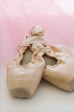 Close up of ballet pointe shoes.