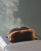 Toast burning in toaster.