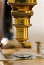Close up of old fashioned microscope.