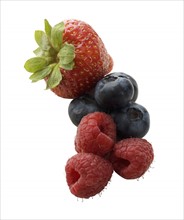 Close up of strawberry, raspberries and blueberries.