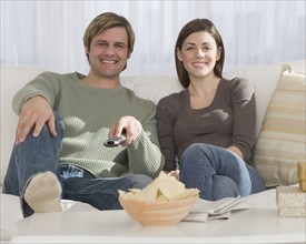Couple watching television.