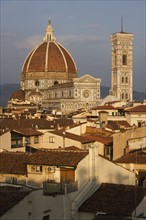 City rooftops and the Duomo Santa Maria Del Fiore, Florence, Italy.
