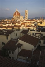 City rooftops and the Duomo Santa Maria Del Fiore, Florence, Italy.