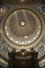 Interior view of dome and canopy in St. Peter’s Basilica, Vatican City, Italy.