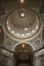 Interior view of dome and canopy in St. Peter’s Basilica, Vatican City, Italy.
