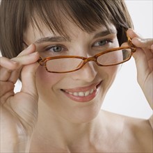 Woman wearing eyeglasses.