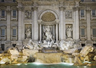 Trevi fountain and statues, Rome, Italy.
