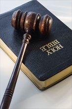 Judge’s gavel on bible.