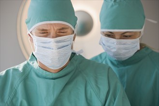 Doctors wearing surgical masks.