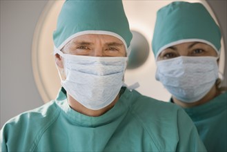 Doctors wearing surgical masks.