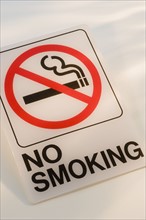 Close up of no smoking sign.