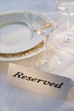 Reserved sign at place setting.