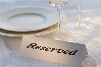 Reserved sign at place setting.