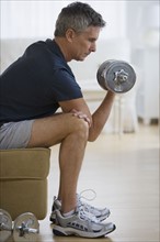 Man lifting weights.
