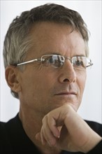 Man wearing eyeglasses.
