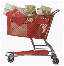Shopping cart full of gifts.