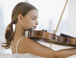Girl playing violin.