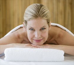 Woman on spa treatment table.