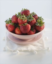 Close up of bowl of strawberries.
