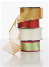 Studio shot of stack of ribbons. Date : 2006