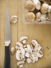 Chopped mushrooms on cutting board. Date : 2006