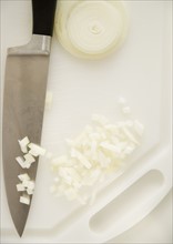 Chopped onions on cutting board. Date : 2006