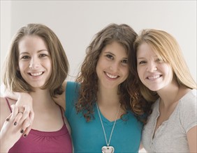 Portrait of teenage girls hugging. Date : 2007