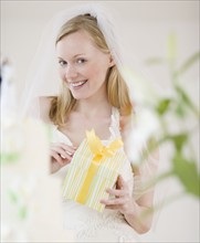 Bride holding gift. Date : 2007