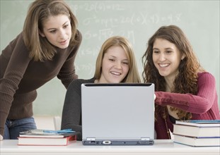 Female students looking at laptop. Date : 2007
