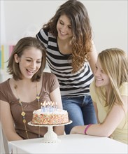 Teenage girl celebrating birthday with friends. Date : 2007