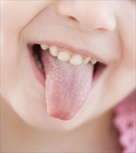 Close up of girl sticking out tongue. Date : 2007