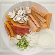 Chopped vegetables on plate. Date : 2006