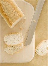 Sliced bread on cutting board. Date : 2006