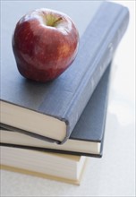 Close up of apple on stack of books. Date : 2006